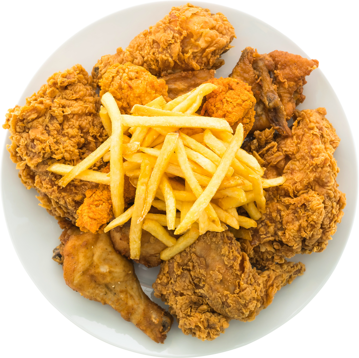 Fried chicken and french fries in white plate